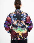 OSCAR MENDOZA Purple jacket with white zip and psychedelic pattern