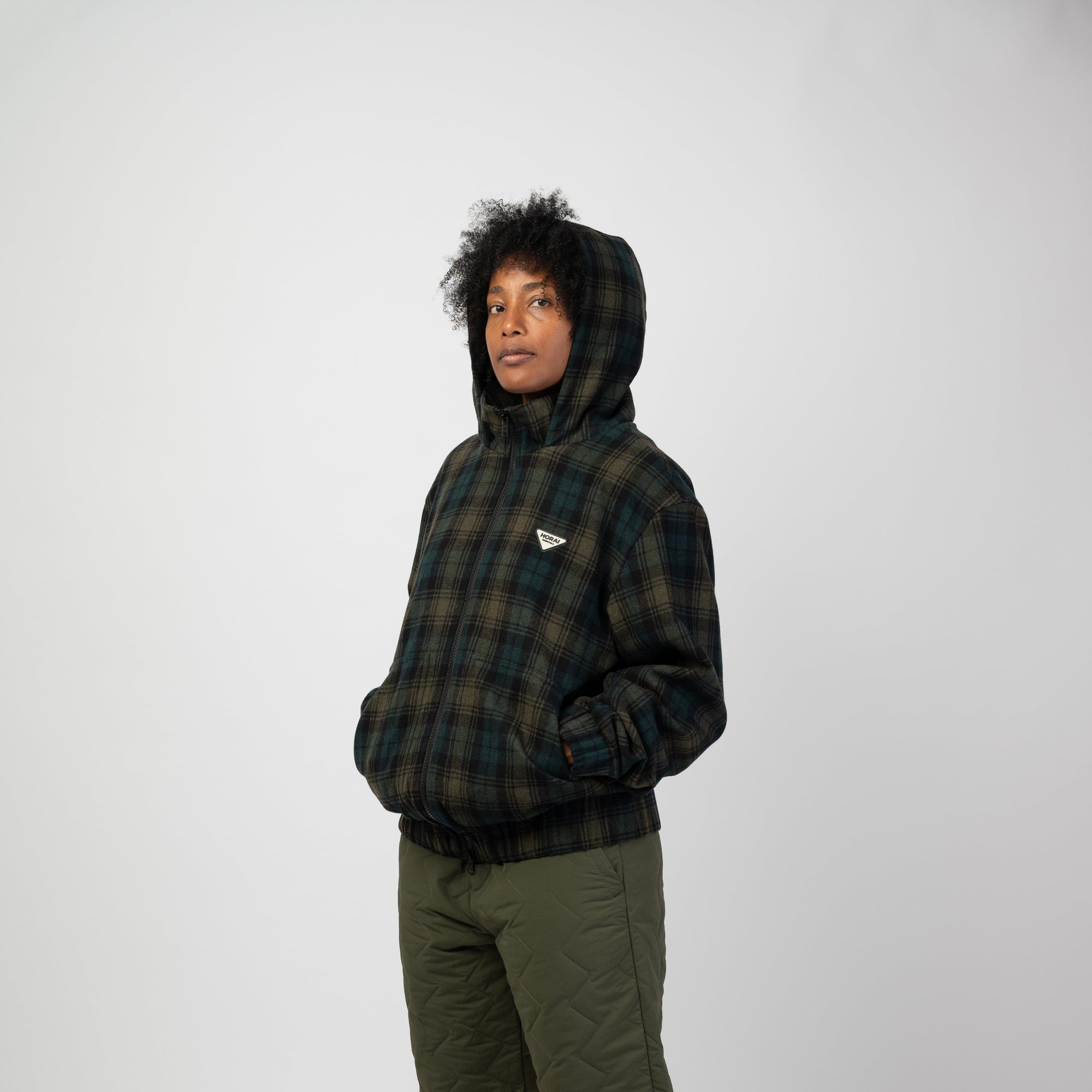 HORAI Wool bomber en vert à carreaux